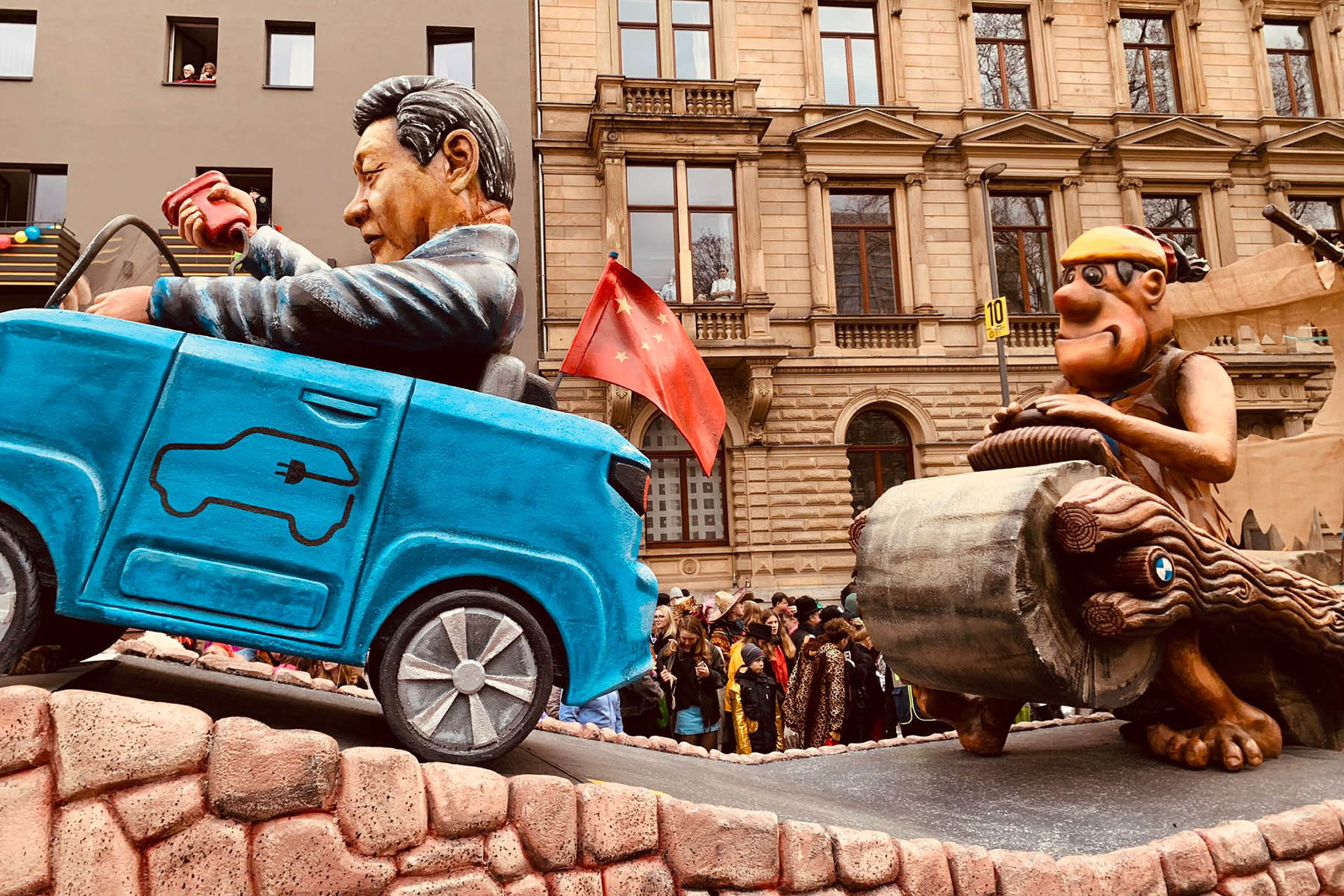 Mainz Carnival parade float throws shade at German EV industry