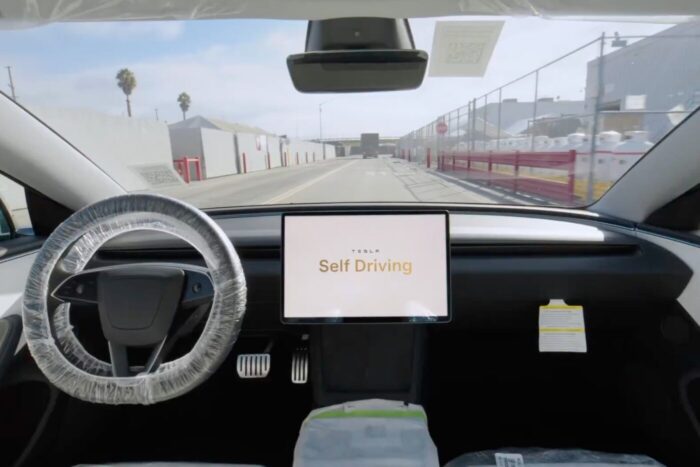 Tesla unsupervised full self driving fsd robotaxi